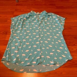 Bright blue pleione blouse with umbrellas. Size L